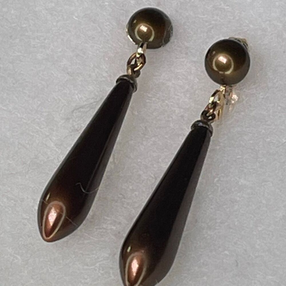Vintage dangle drop torpedo shaped bronze earrings. Midcentury clip style